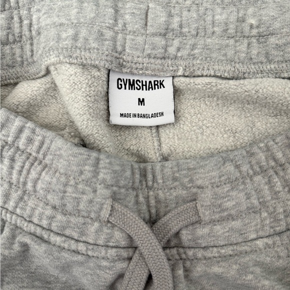 Gymshark Men’s Crest Joggers Sweatpants Grey Slim Taper Fleece Workout Athletic - Picture 3 of 5